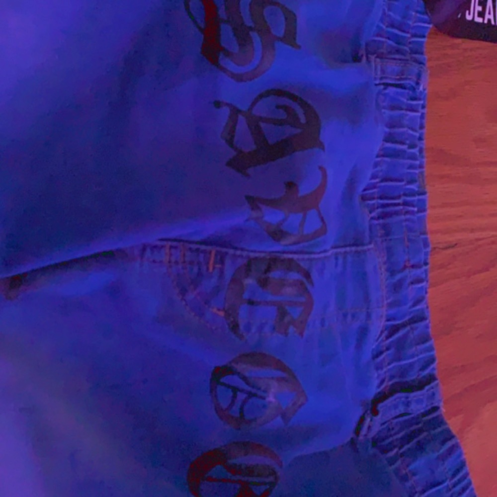 Blue baggy jeans logo “savage imprinted on the top